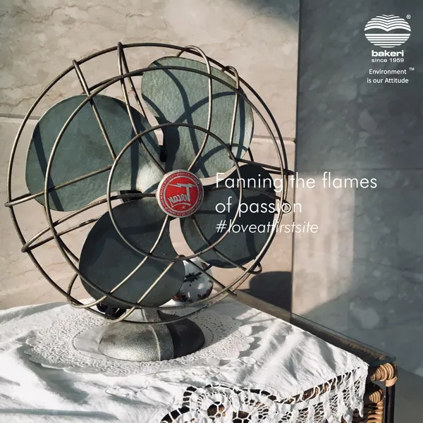 Vintage table fan on a lace cloth, 'Fanning the flames of passion'.