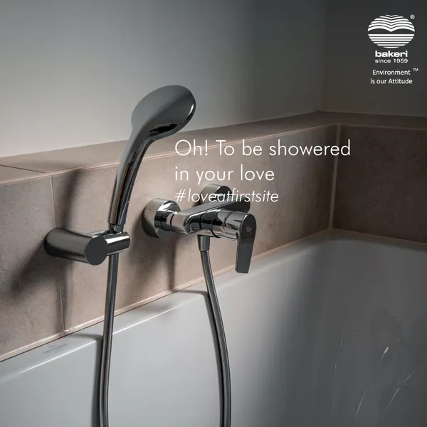A hand shower above a white bathtub, 'Oh! To be showered in your love'.