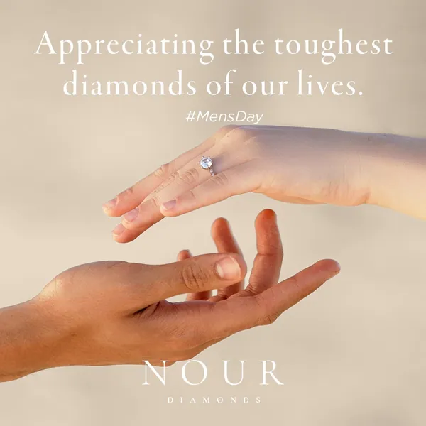 International Men's Day: a ring offered from one hand to another.