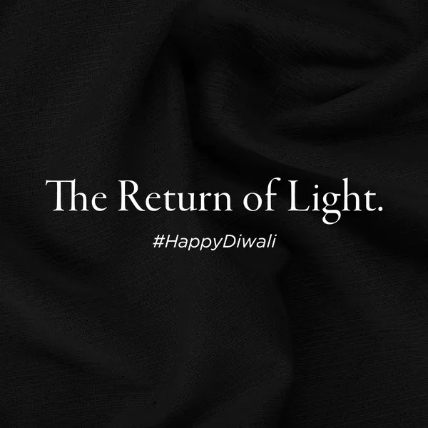 Centre panel: a line about the return of light, set in serif on black silk.