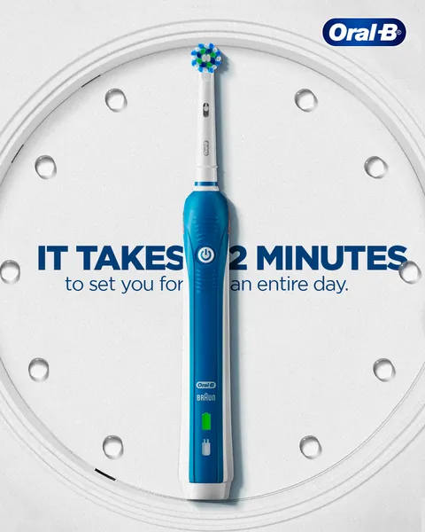 Clock-face concept: a blue electric brush becomes the hand, 'It takes 2 minutes'.