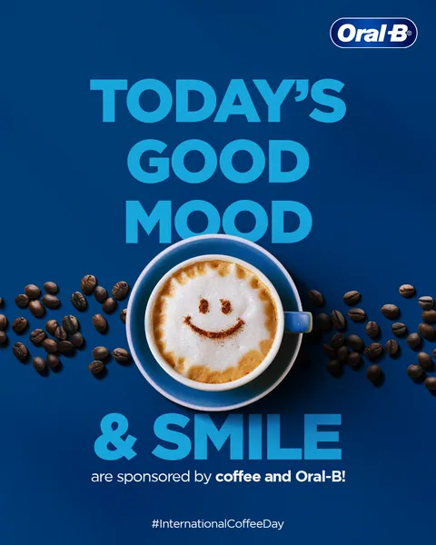 International Coffee Day: smiley latte art and beans, 'Today's good mood & smile'.