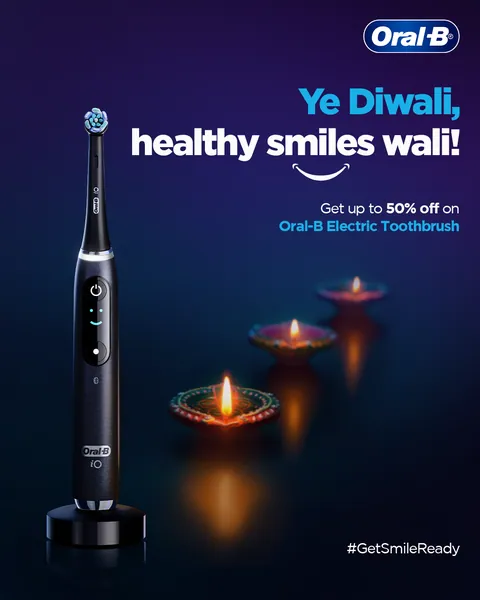 'Ye Diwali, healthy smiles wali!' A black iO brush stands among glowing diyas.