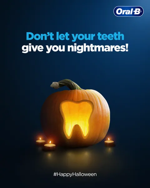 'Don't let your teeth give you nightmares!' A tooth-shaped jack-o'-lantern for Halloween.