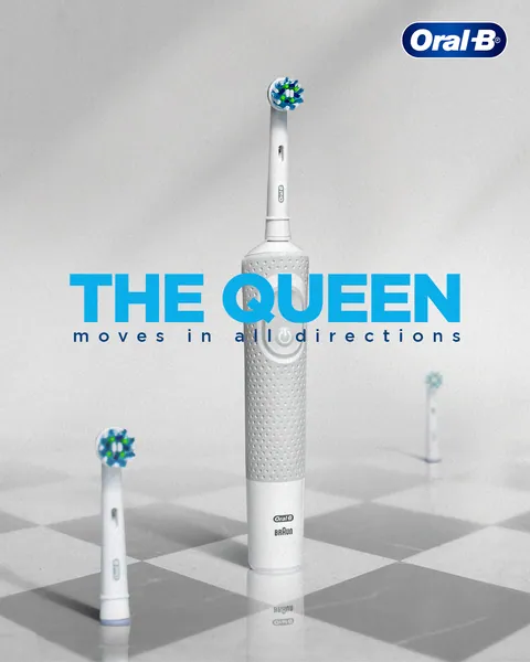 Chessboard scene where a white electric brush is the queen that 'moves in all directions'.