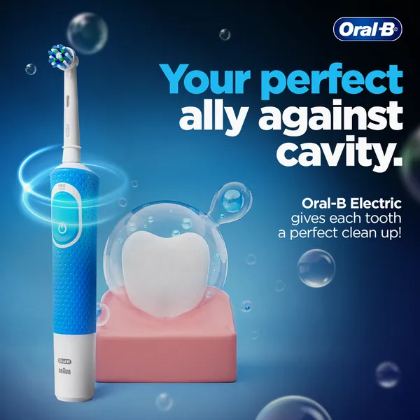 Bubbles float by a blue electric brush and a tooth: 'Your perfect ally against cavity'.