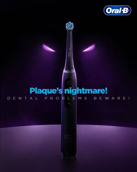 Dubbed 'Plaque's nightmare!', a black iO brush stands under glowing purple eyes.