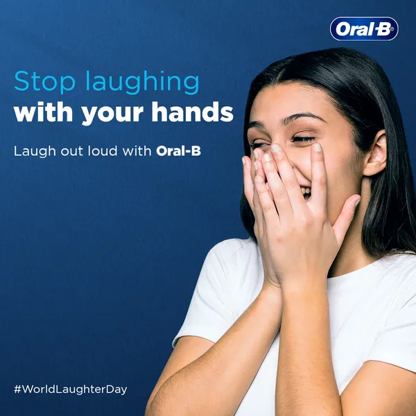 'Stop laughing with your hands': a woman covers her laugh in a World Laughter Day post.