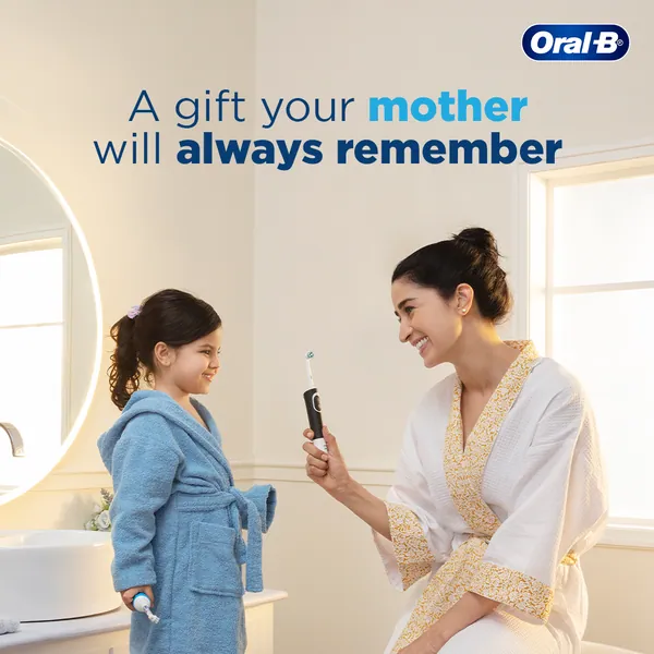 'A gift your mother will always remember': a mother shows her daughter an electric brush.