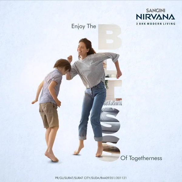 Sangini Nirvana word post: a mother and son dance beside giant letters spelling bliss.