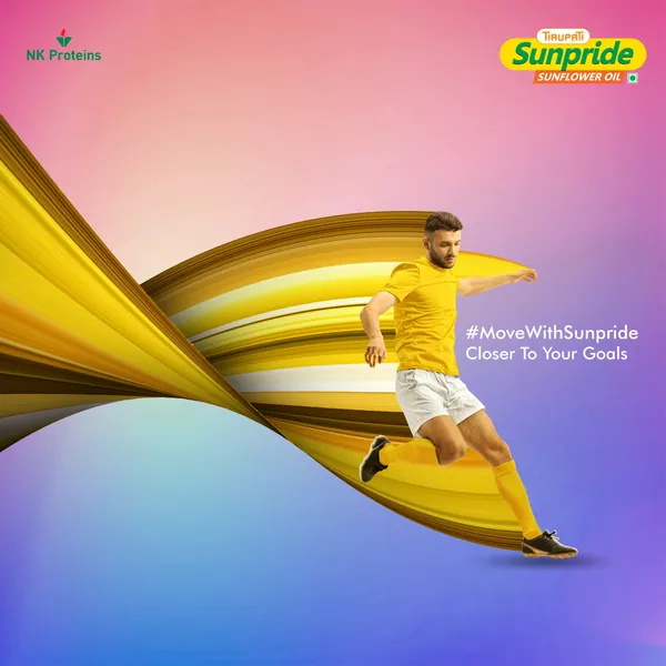 A footballer in yellow bursts from a golden swirl, 'Closer to your goals'.