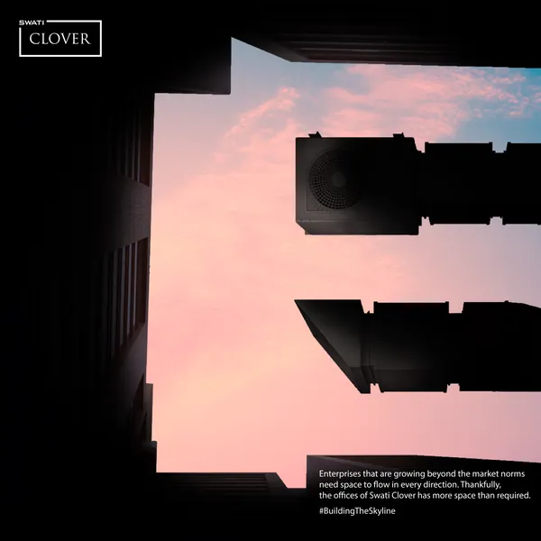 CLOVER grid, letter E: a pink sky shaped by balconies.