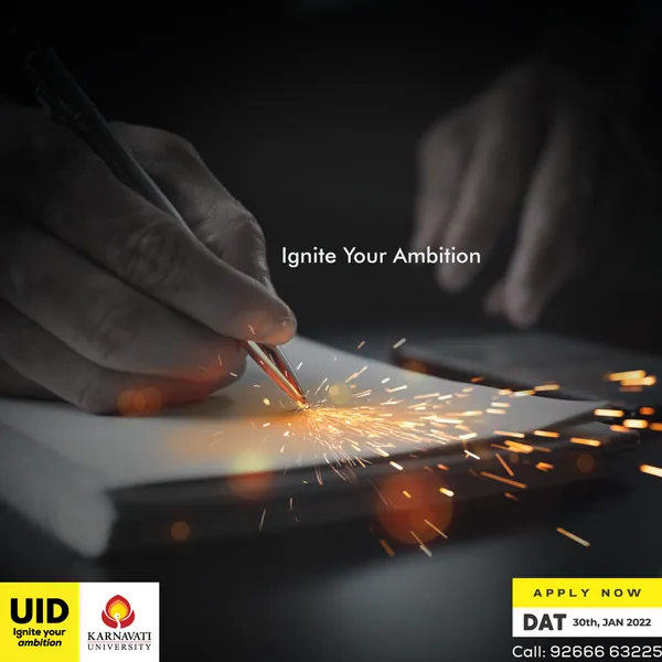 A hand sketching on paper sends up sparks in this UID 'Ignite Your Ambition' post.